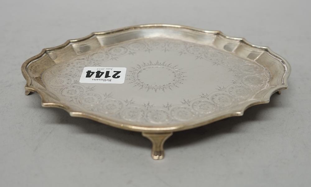 A George III silver teapot stand, of shaped oval form, with bright cut engraved decoration, - Image 6 of 7