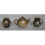 Clare Sutcliffe (1943-2019), a tea pot, milk jug and sugar jar,