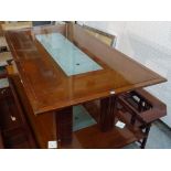 A 20th century stained beech rectangular dining table, with inset glass middle on block supports,