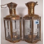 A pair of late 19th / early 20th century pierced brass hexagonal lanterns, 36cm high.