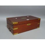 A Regency brass bound writing slope, with fitted interior and side sprung drawer,