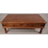 A 20th century hardwood rectangular coffee table, with two drawers on tapering supports.