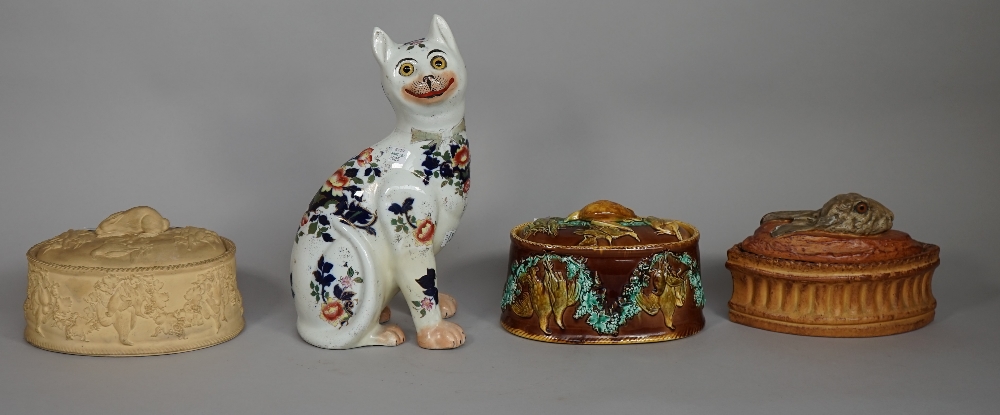 A polychrome painted porcelain game dish with moulded rabbit to lid,