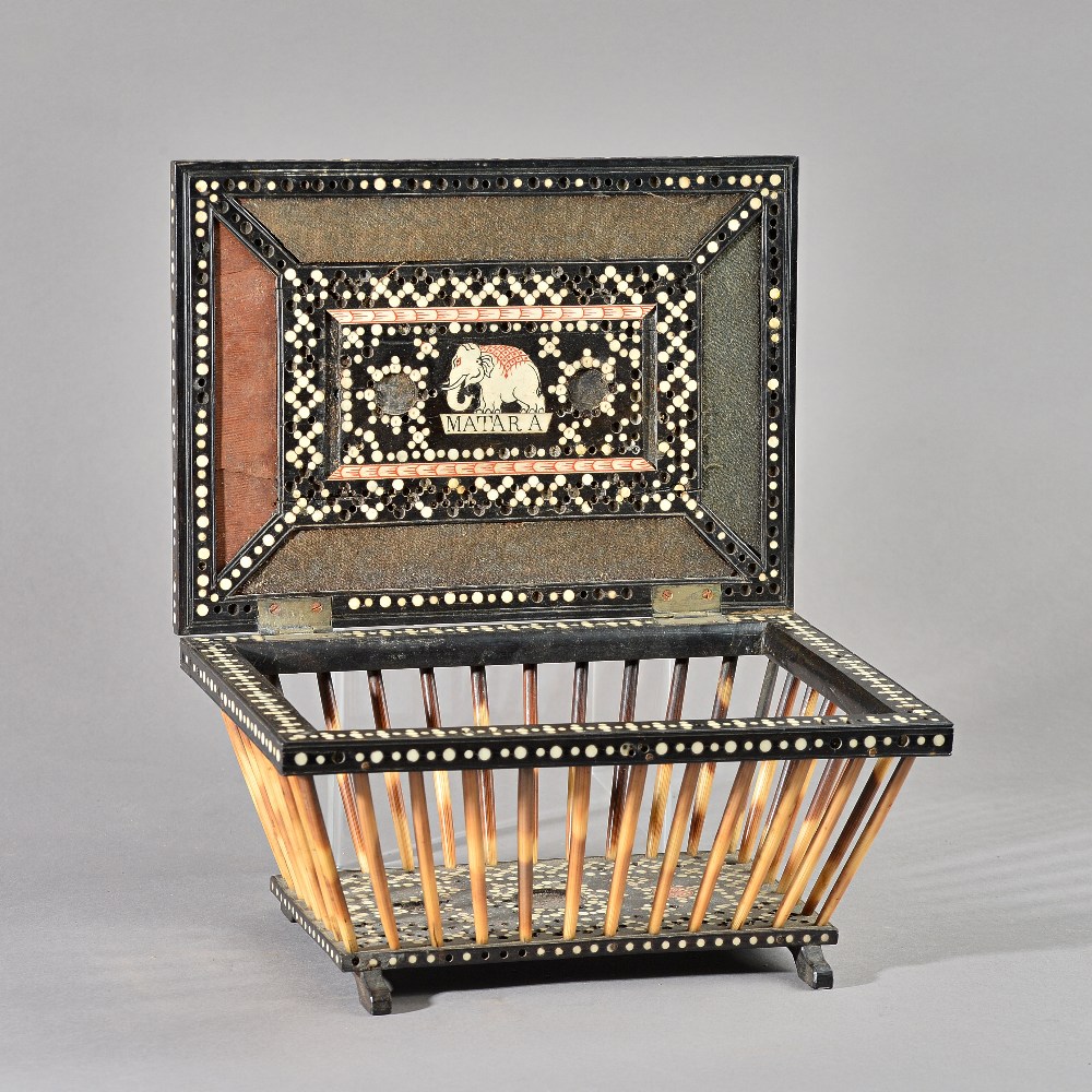 A 19th century Anglo Indian/ Sri Lankan bone inlaid ebony and porcupine quill box,