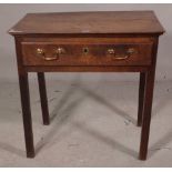 A George III and later oak single drawer lowboy on block supports, 74cm wide x 75cm high.