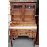 A George IV mahogany cylinder bureau bookcase,