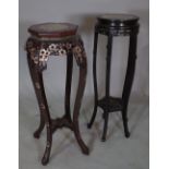 A 20th century Chinese hardwood octagonal jardinaire stand with inset marble top,