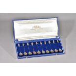 An Elizabeth II set of ten silver apostle spoons, The American Royal Family 1607-1776, cased,