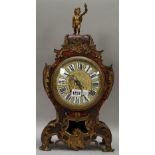 A French boulle work mantel clock of waisted form, 19th century,
