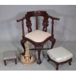 A mid-18th century style hardwood double vase back corner chair on claw and ball feet,