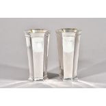 A pair of George V silver vases, each of tapering faceted hexagonal inverted form, London 1933,