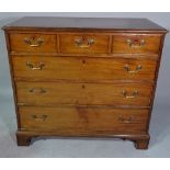 A George III mahogany chest of three short and three long drawers on bracket feet,