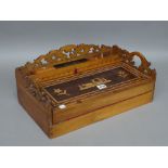 A 19th century Anglo-Indian inlaid hardwood writing slope with fret carved decoration,