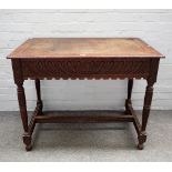 A Victorian carved oak rectangular centre table with gadrooned frieze on turned supports,