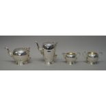 A Elizabeth II silver four piece tea set, comprising; a coffee pot, teapot,