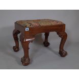A George III style mahogany rectangular stool,
