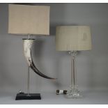 A modern Perspex table lamp of column form on a square foot and one further modern faux horn table