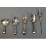 A George III silver caddy spoon with heart shaped bowl and pierced handle,