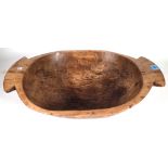 A large 20th century softwood bowl, 58cm wide x 16cm high.