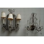 A set of four modern gilt metal and crystal mounted two branch wall lights and one similar larger