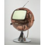 A 1970s (?) perspex cased television of globular translucent "Sputnik" form,