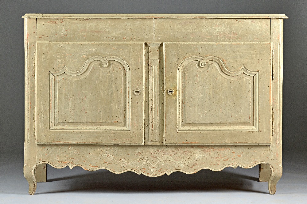 An early 19th century and later painted French two door buffet, on squat cabriole supports,