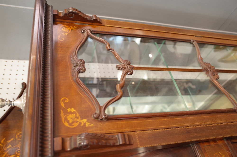 An Edwardian inlaid mahogany mirrored back display cabinet with bowed central compartment over - Image 7 of 8
