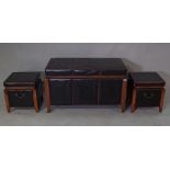 A 20th century hardwood framed and faux black leather upholstered trunk,
