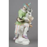 A rare Hochst porcelain figure of Harlequin playing ram bagpipes, circa 1750-53,