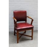 A pair of inlaid 20th century oak open armchairs on block supports, 57cm wide x 61cm high.