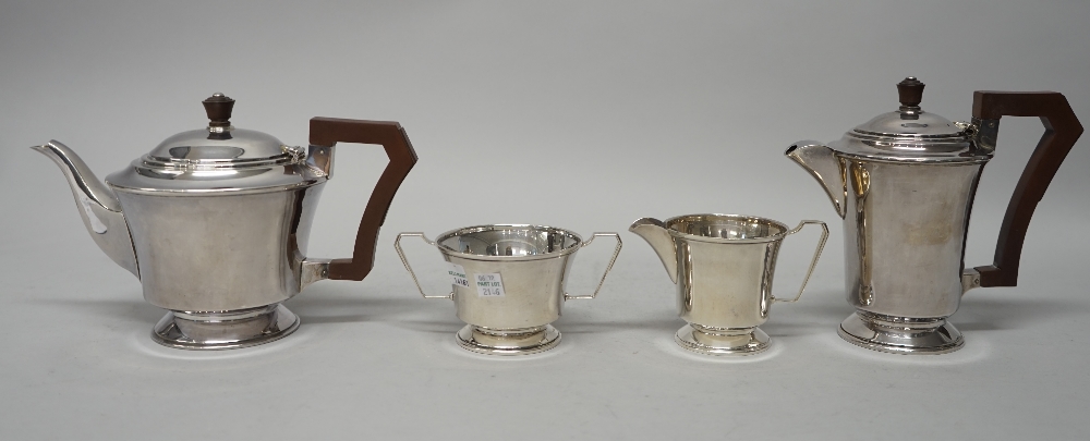 A silver four piece tea set, comprising; a teapot, a hot water jug, - Image 3 of 5
