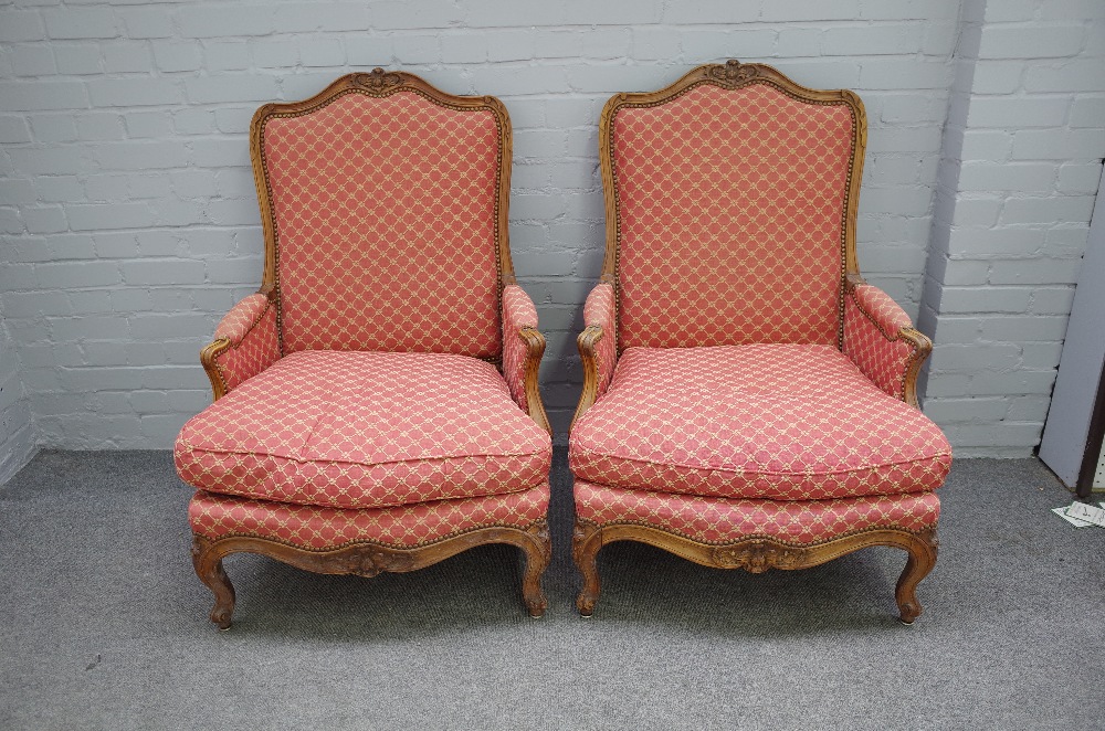 A pair of 19th century beech framed armchairs in the Louis XV style,