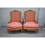 A pair of 19th century beech framed armchairs in the Louis XV style,