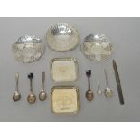 Silver, comprising; a pair of pierced bonbon dishes, Birmingham 1943, a pair of ashtrays,