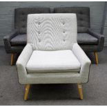 John Lewis; a set of three 1950's style square back easy armchairs on turned beech supports,