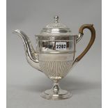 A silver plated on copper coffee pot,