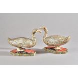A pair of 19th century Chinese mother-of-pearl and ivory duck form box and covers,