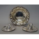 A Mexican silver bowl, of shaped circular form, with a cast scroll rim,