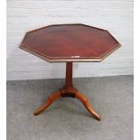 A late Louis XVI brass mounted mahogany tripod occasional table with octagonal snap top 79cm wide x