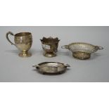 Silver, comprising; an Irish christening mug, decorated with Celtic motifs, Dublin 1930-31,