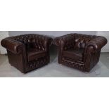 A pair of 20th century brown leather upholstered Chesterfield style armchairs,