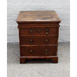 A George I oak close/box stool, lift up lid above dummy drawer front, 47cms wide, 57.5cms high.
