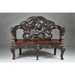 An early 20th century Chinese hardwood bench,