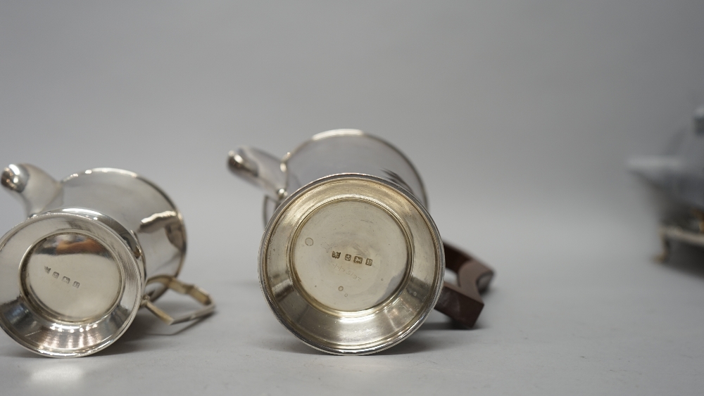 A silver four piece tea set, comprising; a teapot, a hot water jug, - Image 4 of 5