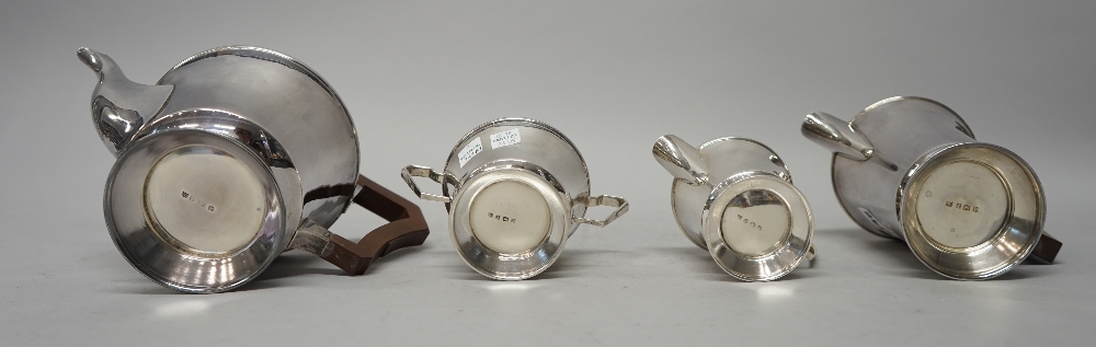 A silver four piece tea set, comprising; a teapot, a hot water jug, - Image 5 of 5