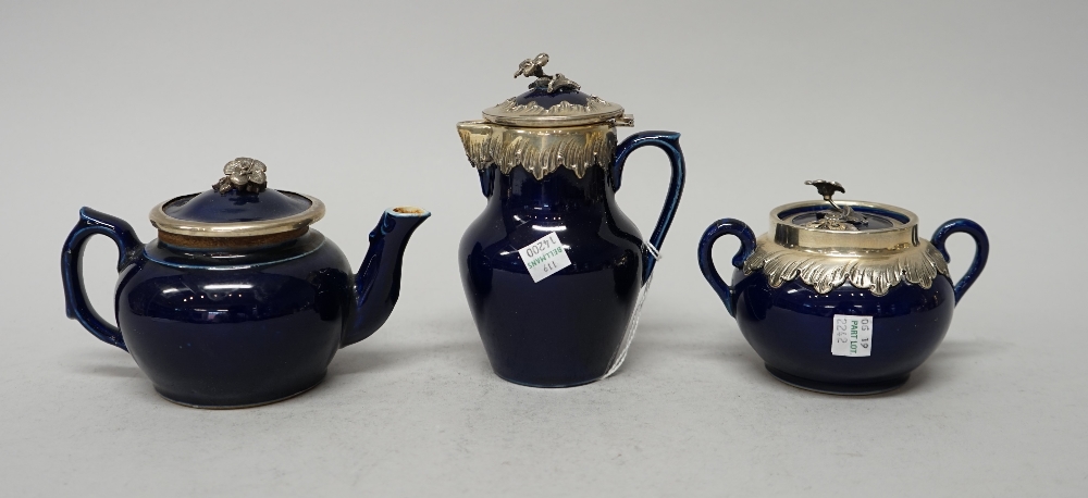 A late 19th century French silver-mounted blue porcelain tea-service,