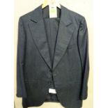 SEAN CONNERY: a bespoke dark grey single breasted wool blend suit,