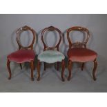 A set of six Victorian walnut ballon back dining chairs, 44cm wide x 87cm high, (6).