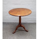 An 18th century mahogany tripod occasional table with circular snap top, 66cm diameter x 71cm high.