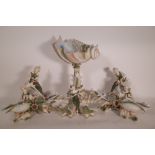 A 20th century three piece ceramic centre piece with cherubs,